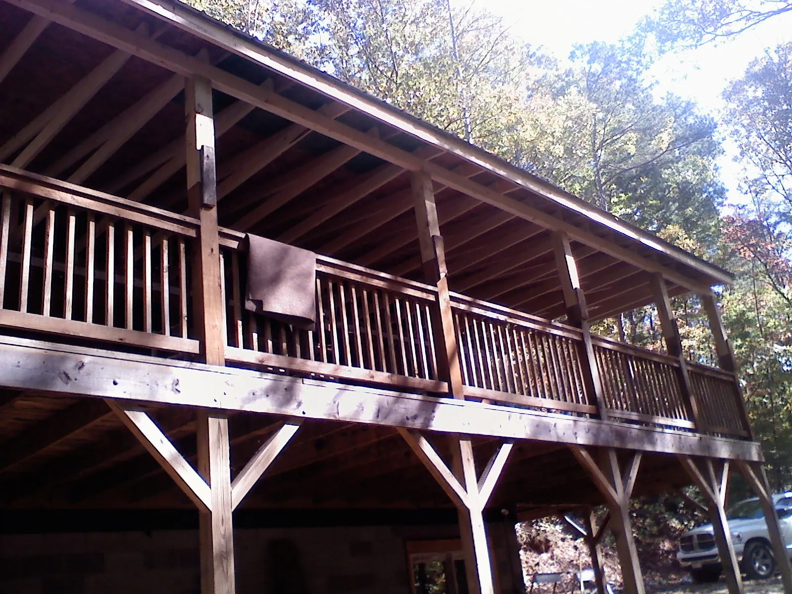 Timber framing under a new elevated porch and deck — Roof Leak Repair in Blackstone by Roofing Brothers